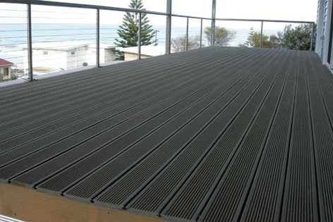 Maintenance-free Eco-Profil composite decking reuses reclaimed wood fibres and recycled plastics.
