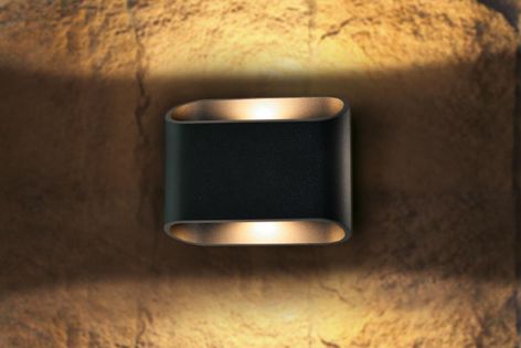 Add modern simplicity to outdoor areas with the Orsay wall light from Studio Italia.