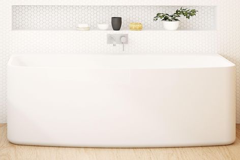 Dual reclined ends with a centre waste make the Caroma Urbane bath comfortable for two.