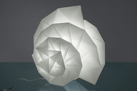 IN-EI Issey Miyake is a collection of strikingly geometric freestanding, table and hanging lights.