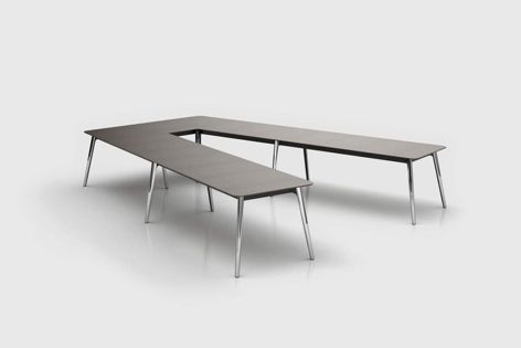 The Keypiece conference system by Walter Knoll has concealed cable routing and media connections for a seamless overall look.