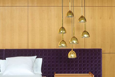 Available from Domo, Brass Bells lighting by Ligne Roset is a warm, elegant addition to interior spaces.
