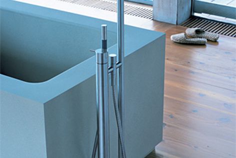 The Vola FS1 floor-mounted bath mixer is available for freestanding and fitted baths.